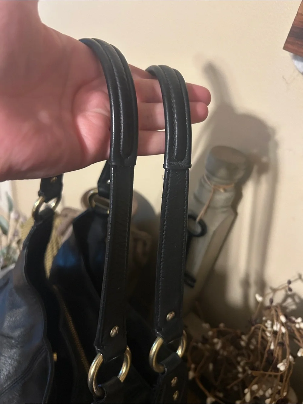 Coach Black Leather Shoulder Bag with Front Buckle Pocket and Gold Hardware